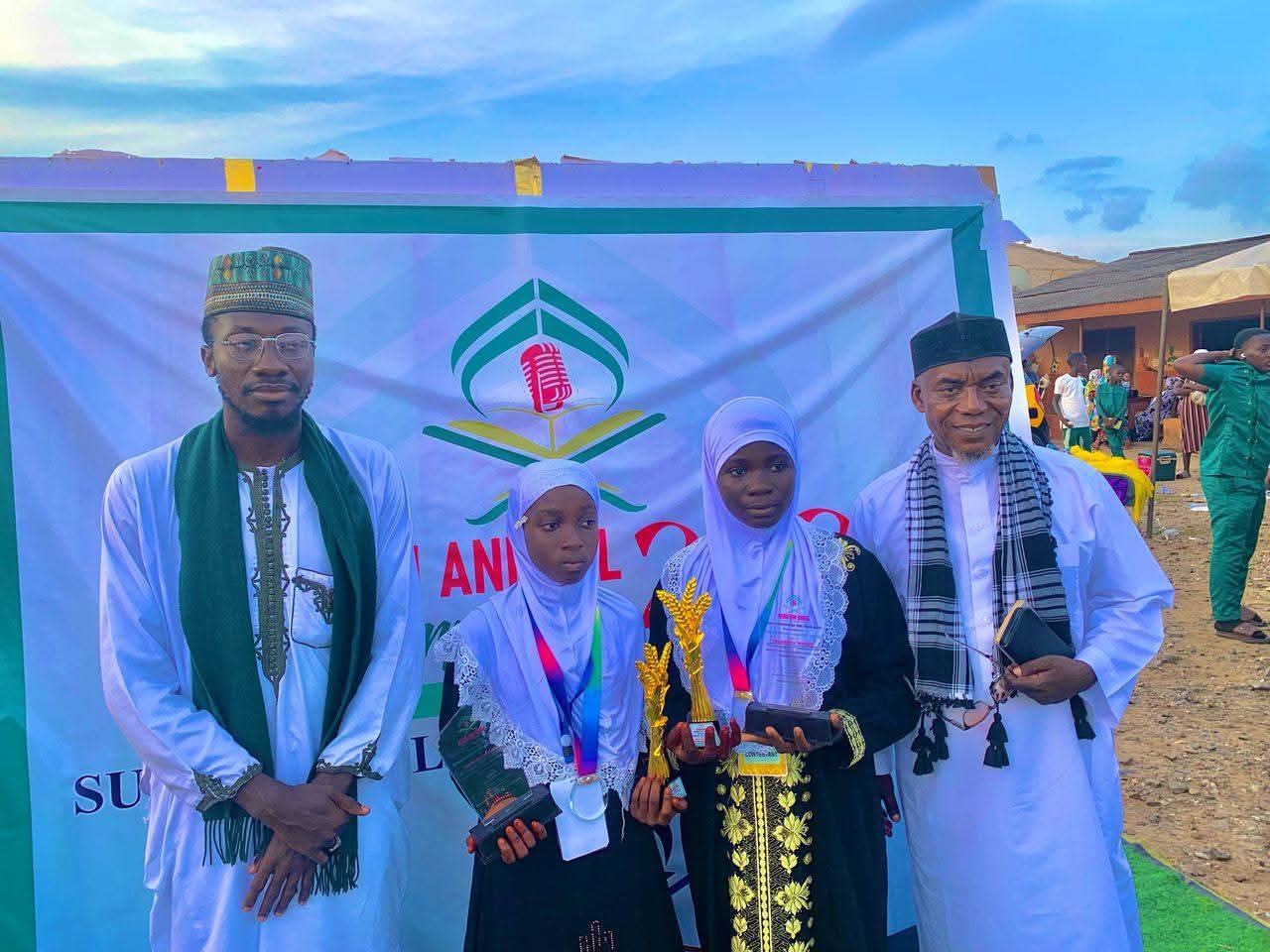 Female Musabaqa winners posing for a group photo
